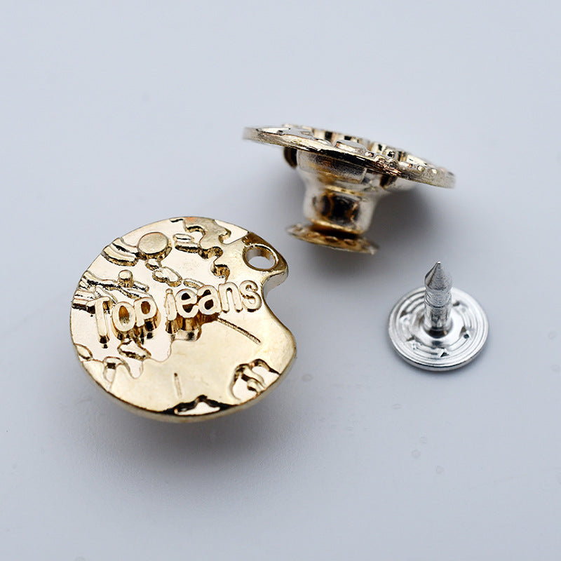 Round metal shank stud button with “TopJeans” style lettering