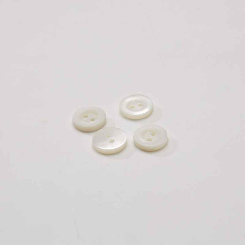 Polished taro shell buttons, 2-hole, ivory—4 button set