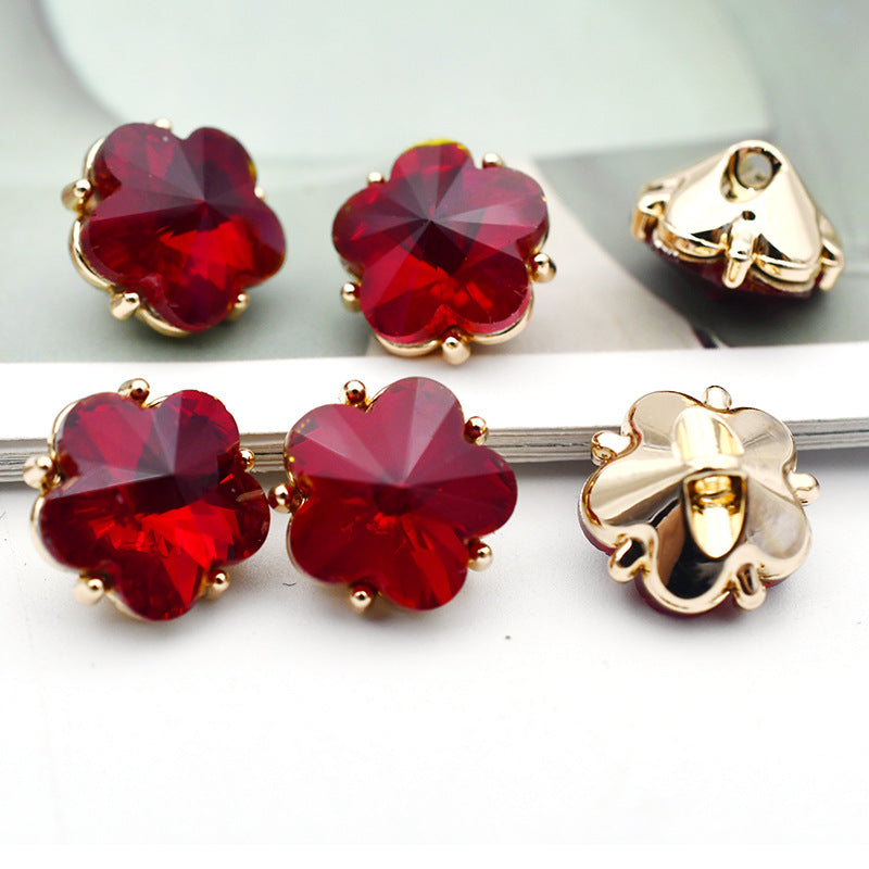 Small flower glass rhinestone shank buttons, red flower faces with gold-tone settings and metal shanks