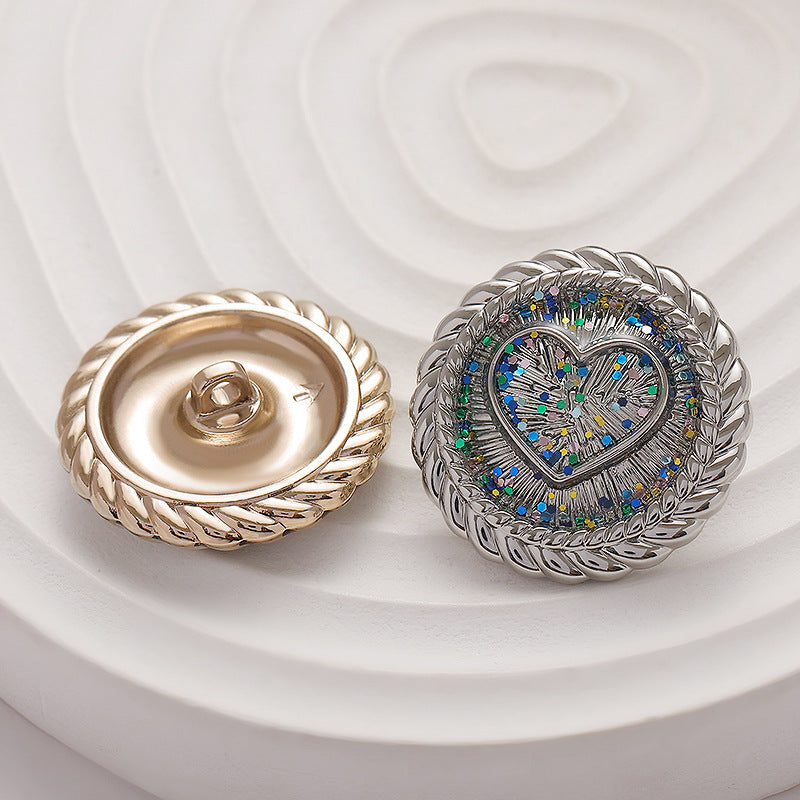 Gold and silver heart metal shank buttons, one back view, braided rim, glitter centers