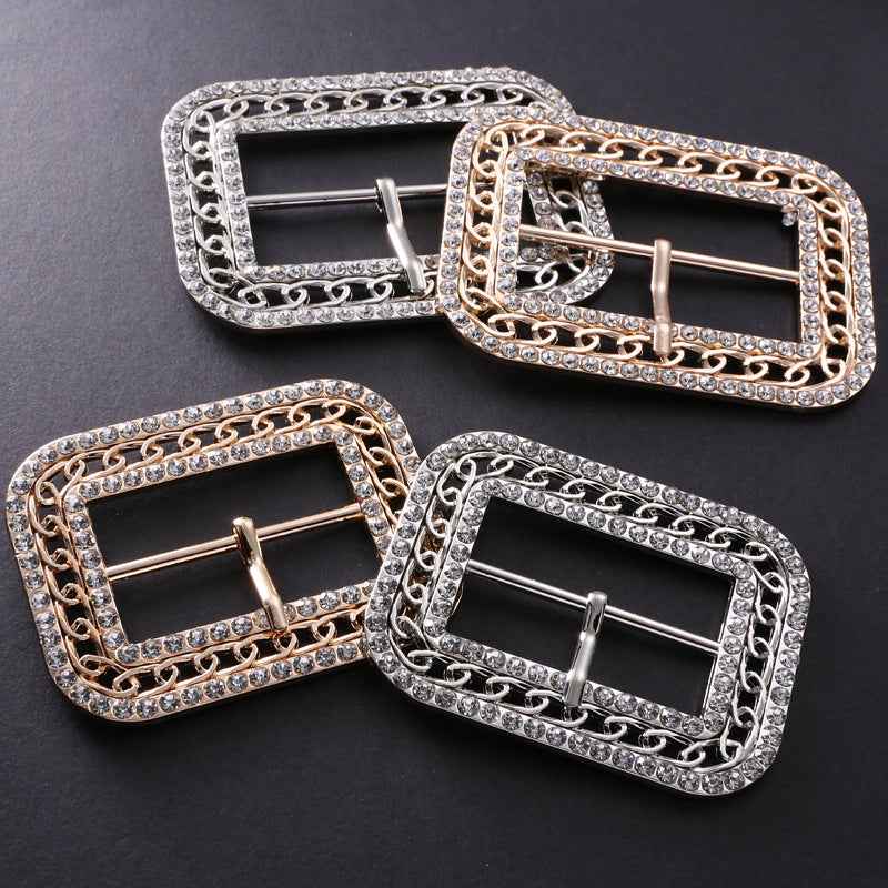 Assorted crystal coat clasps with pin closure, silver and gold tones, 4 pieces shown