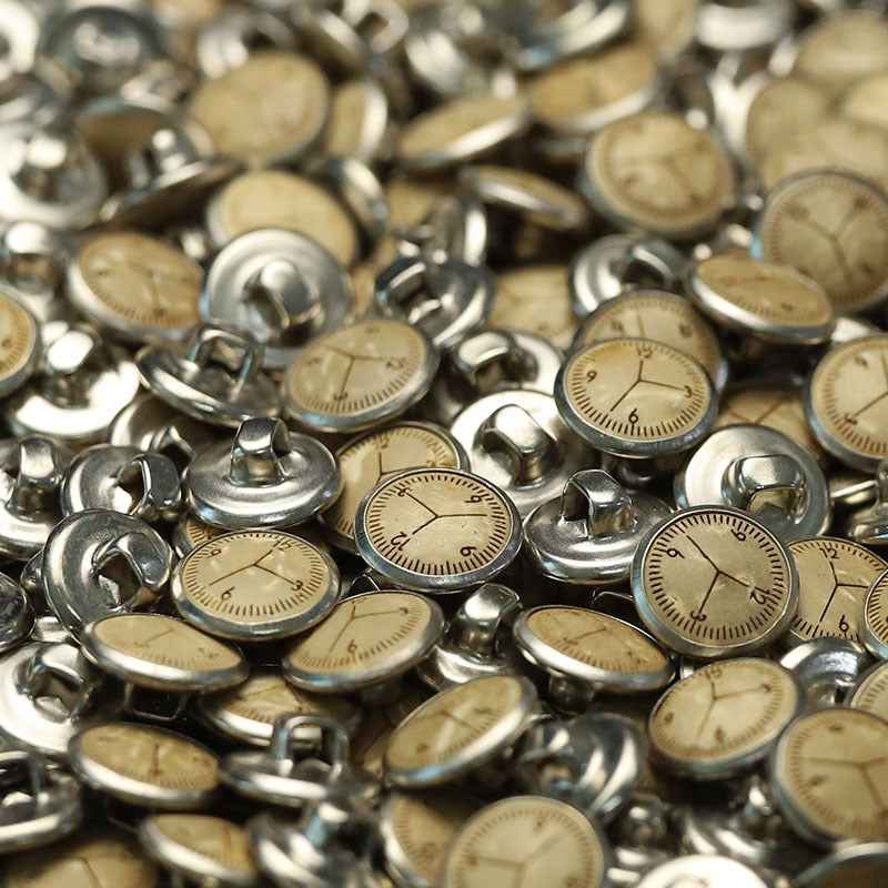 Assorted 11.5mm clock coconut buttons with silver bases and metal shanks