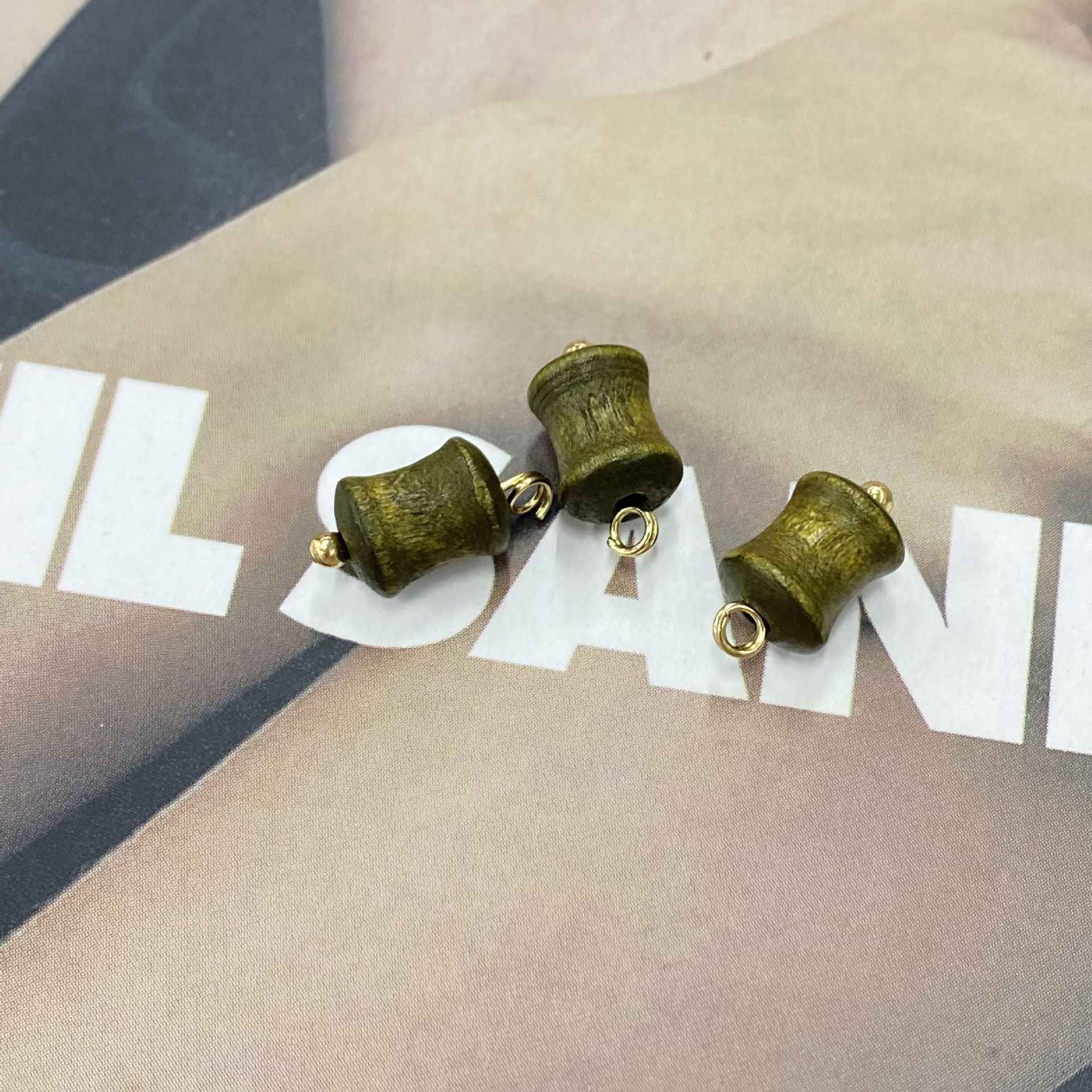 Green wooden concave cylinder buttons with gold loops, 8mm style