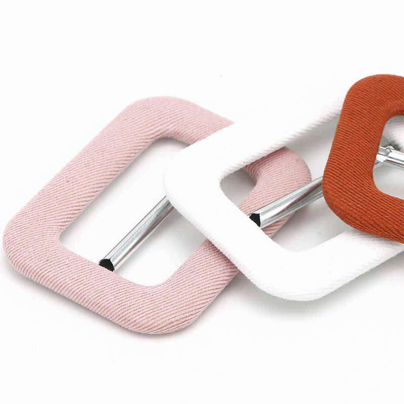 Fabric-covered metal D-ring buckles, light pink and orange with adjustable bars