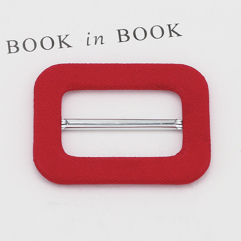 Fabric-covered D-ring buckle for belt adjustment, red fabric with silver metal bar
