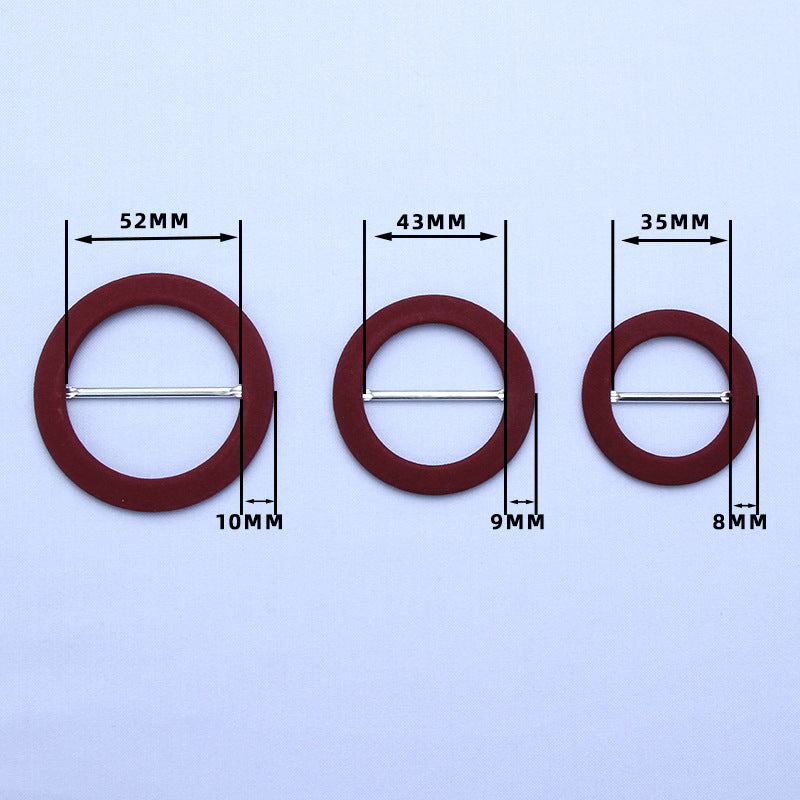 Wine/maroon round fabric-covered D-ring buckle with metal adjustment bar; sizes shown