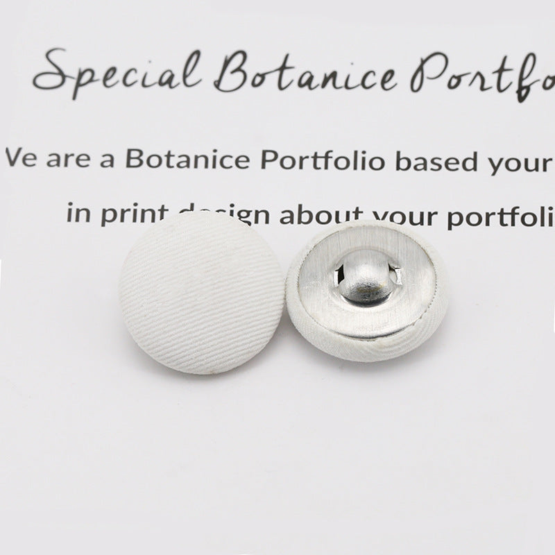White fabric-covered shank buttons: round top and back with visible metal shank