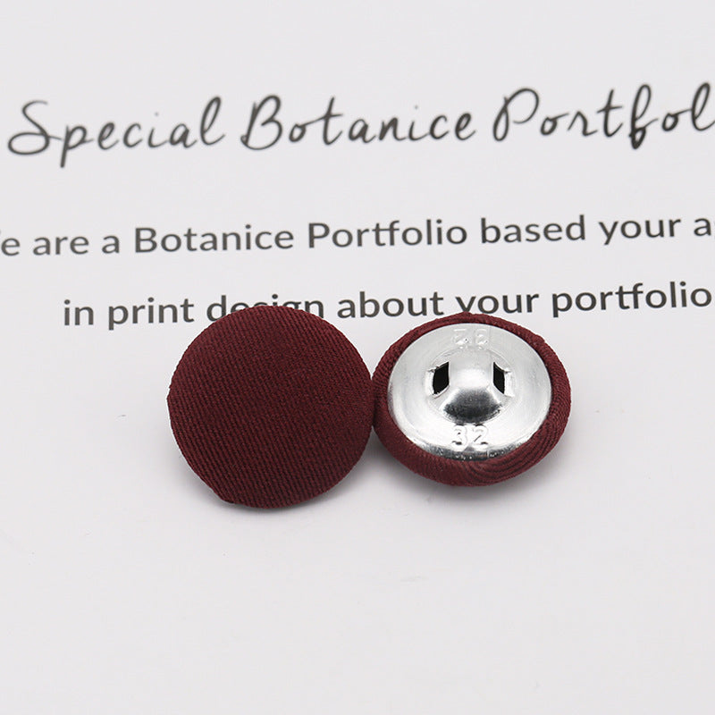 Burgundy fabric-covered shank buttons: round top and underside with metal shank