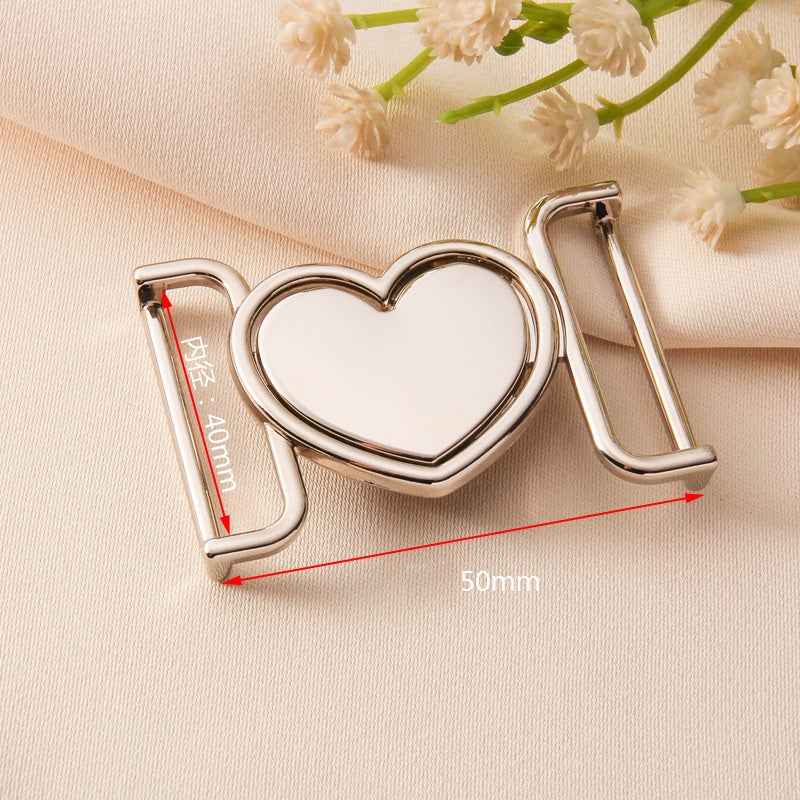 Silver-tone heart belt buckle clasp with size markings 40mm and 50mm