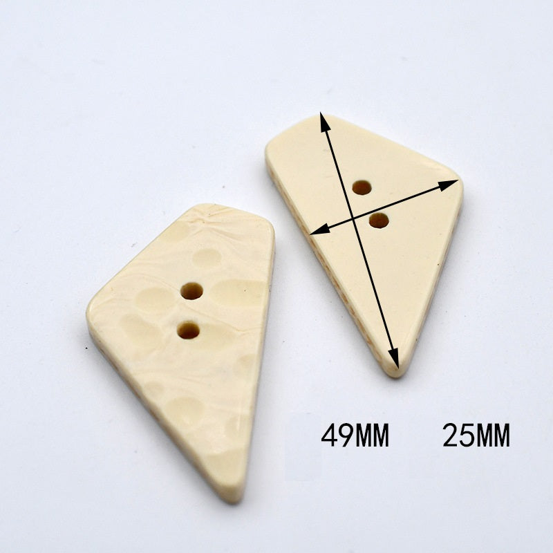 Triangular beige resin buttons with 2 holes; measurements 49mm and 25mm shown