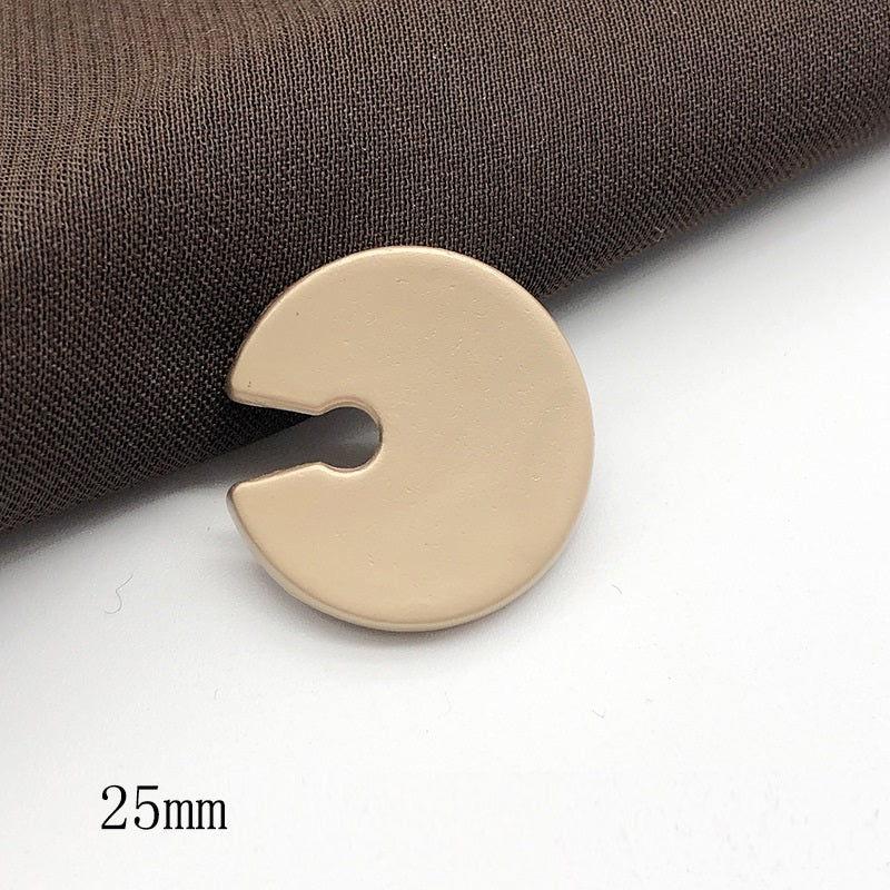Pac-Man style sand gold metal shank button, round face with notch; 25mm size
