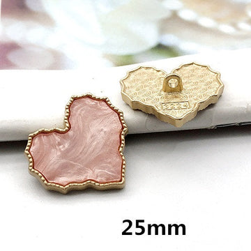 25mm herzförmiger Knopf, rosa Perlmuttoptik, goldfarbener Rand, Stegöse
