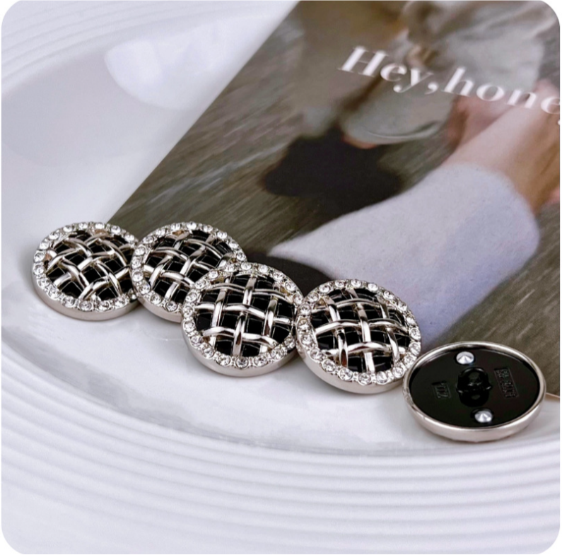 Silver-tone round rhinestone grid shank buttons with visible sewing shank