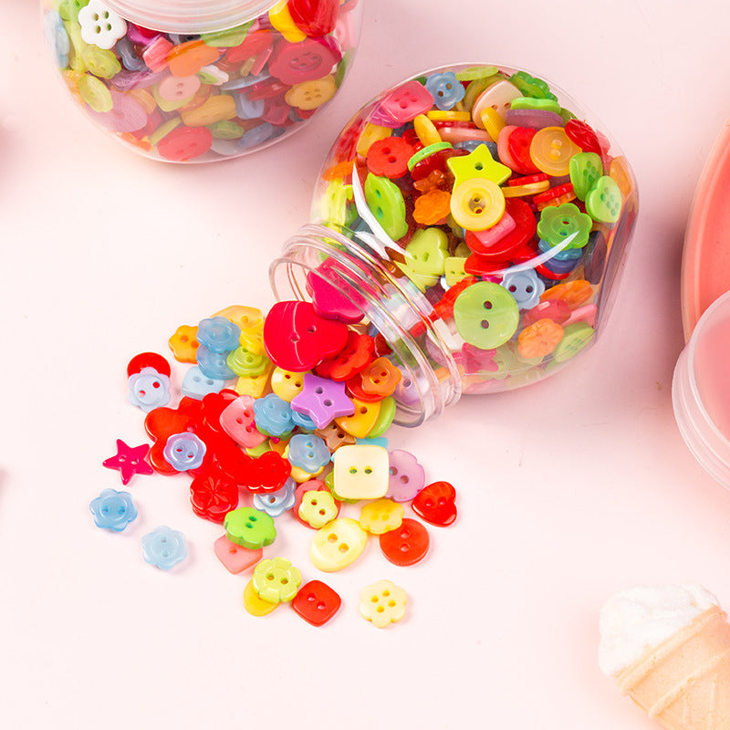 Scattered candy-colored craft buttons spilling from clear bottles; flower shapes.