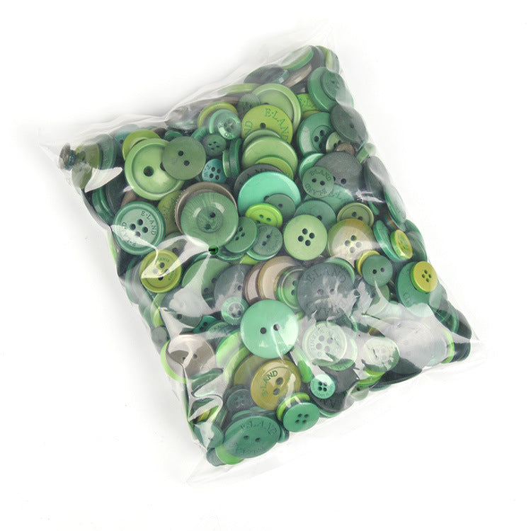 Green resin craft buttons in a clear bag, featuring 2- and 4-hole styles