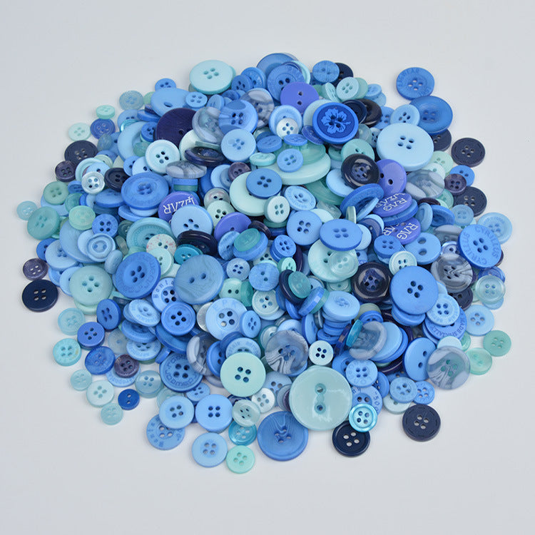 Blue-toned resin craft buttons pile with round 4-hole button faces