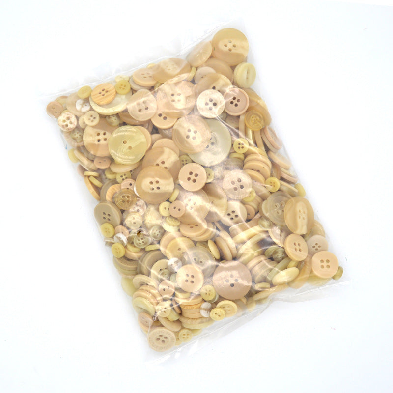 Beige and cream resin craft buttons in a clear bag with round 4-hole styles