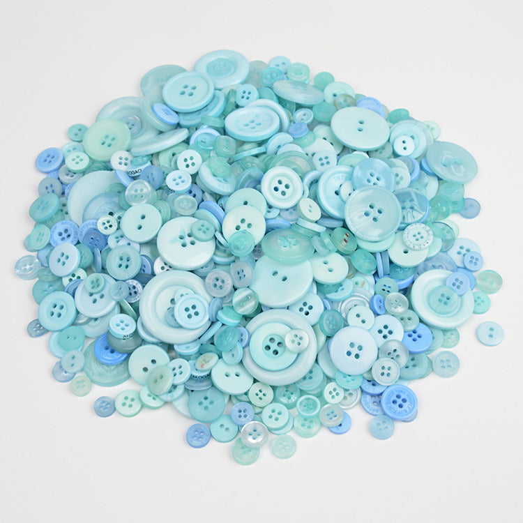 Light blue resin craft buttons, round four-hole pattern, assorted sizes