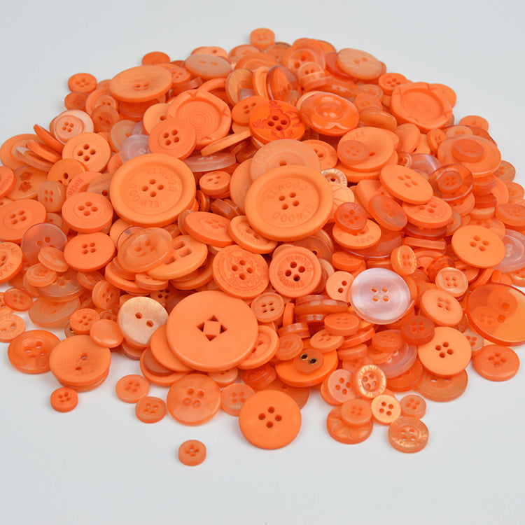Orange resin craft buttons, round four-hole designs, mixed sizes
