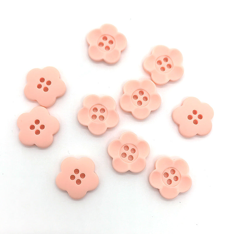 Matte pale pink flower buttons, four-hole, set of 60