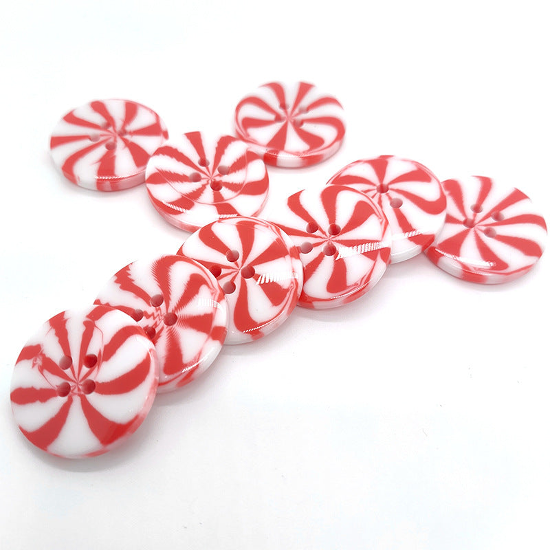 Assorted round resin buttons with red/white windmill candy swirl, four holes
