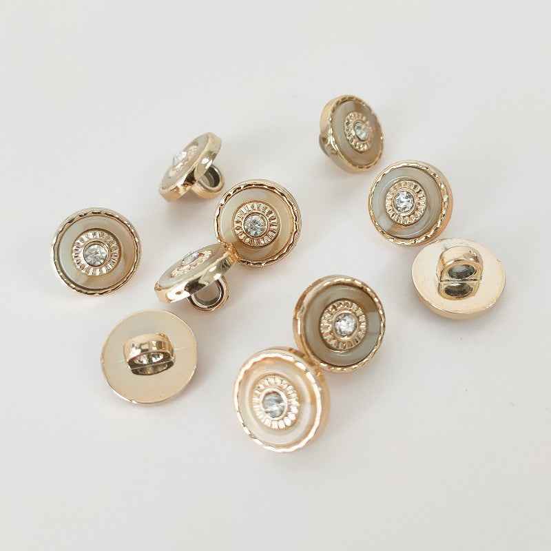 Gold plastic shank buttons with round rhinestone centers, 2-hole back
