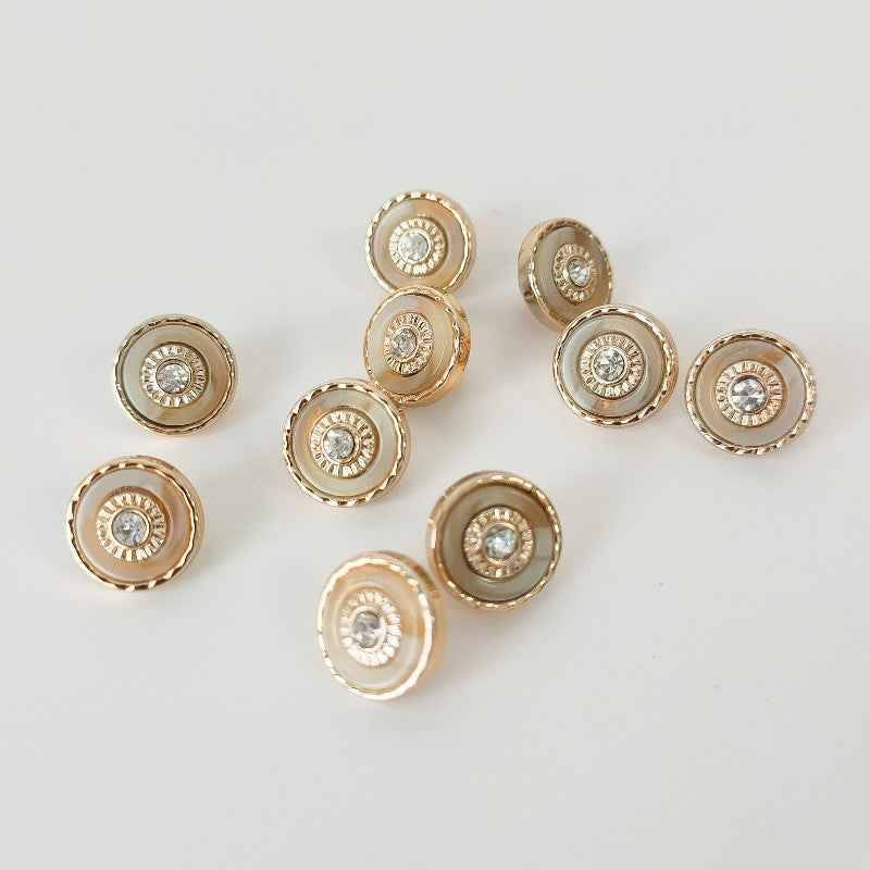 Gold plastic shank buttons with round clear rhinestone center, assorted views