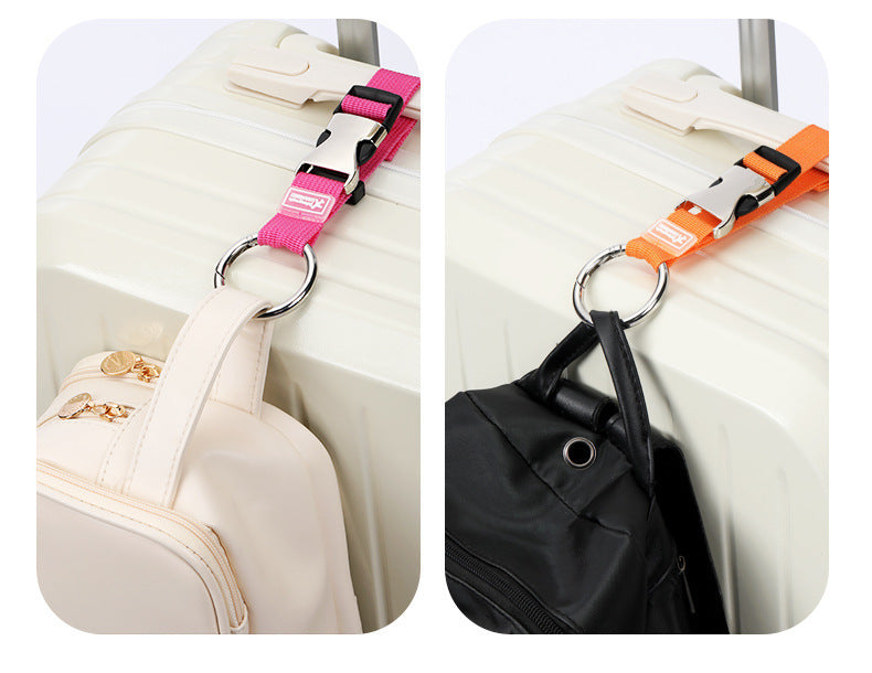 Add-a-bag luggage strap on suitcase with pink and orange ring hooks