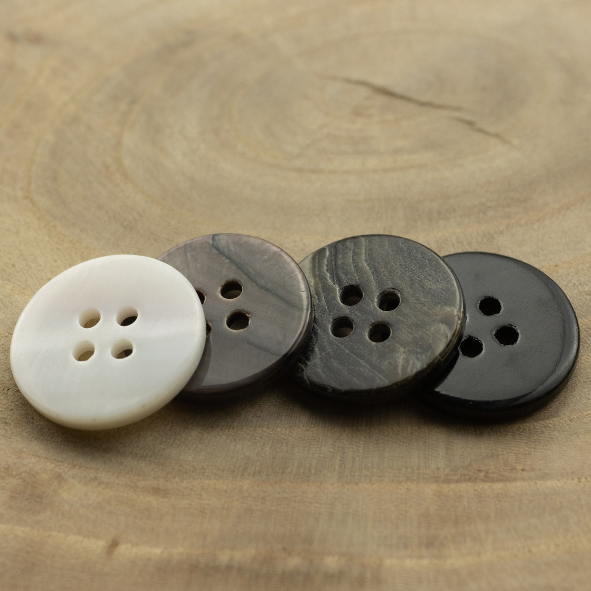 Flat 4-hole butterfly shell button, dark gray-brown, 10-pack