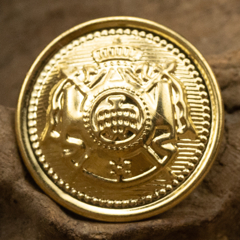 Gold metal shank button close-up front with wheat emblem and inner crest