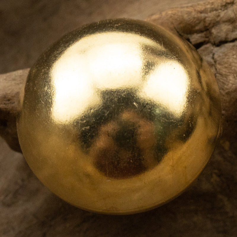 Gold mushroom shank button, round vintage metal cap with reflective shine