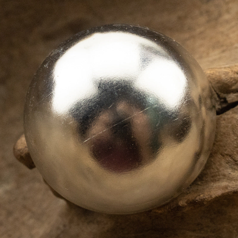 Silver mushroom shank button, round vintage metal cap with reflective highlights