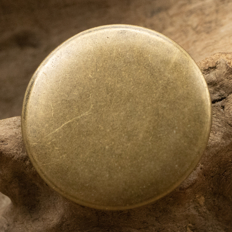 Round vintage metal button, antique bronze tone finish with hollow shank