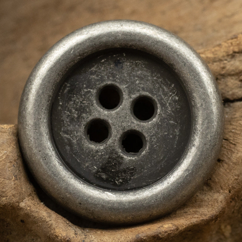 Round 4-hole metal button with antique silver finish and four holes