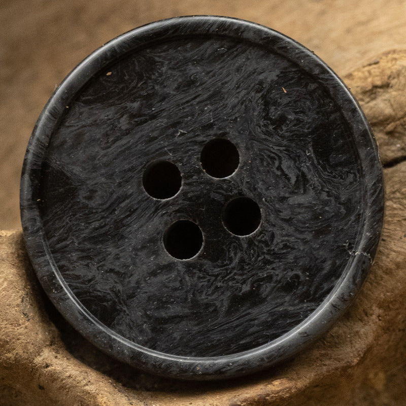 Black marble-look resin button, 4-hole, vintage style.