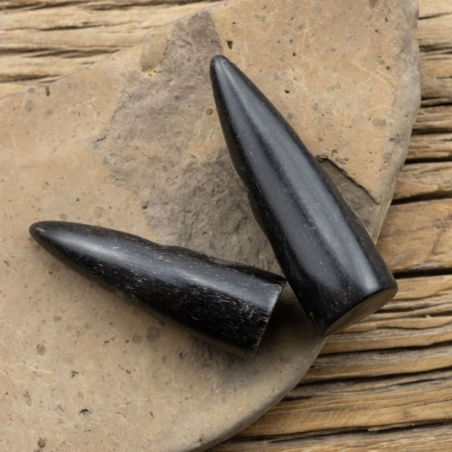 Black natural real horn toggle buttons, 5pcs—teardrop shapes shown from side