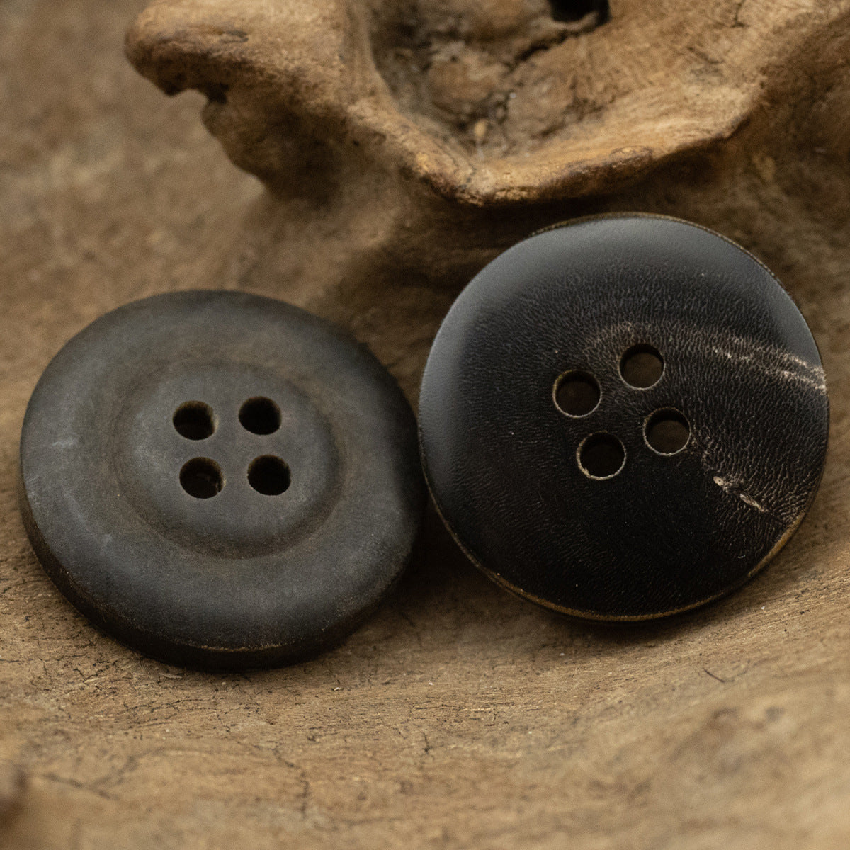 Real horn buttons, two 4-hole fronts with dark-toned surface and threaded holes