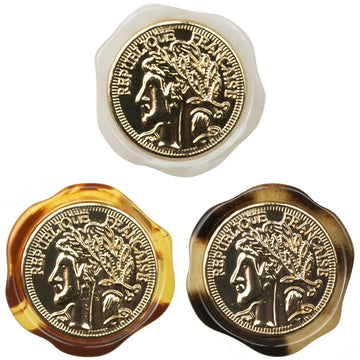 Irregular resin shank button, white, embossed portrait with gold-tone border