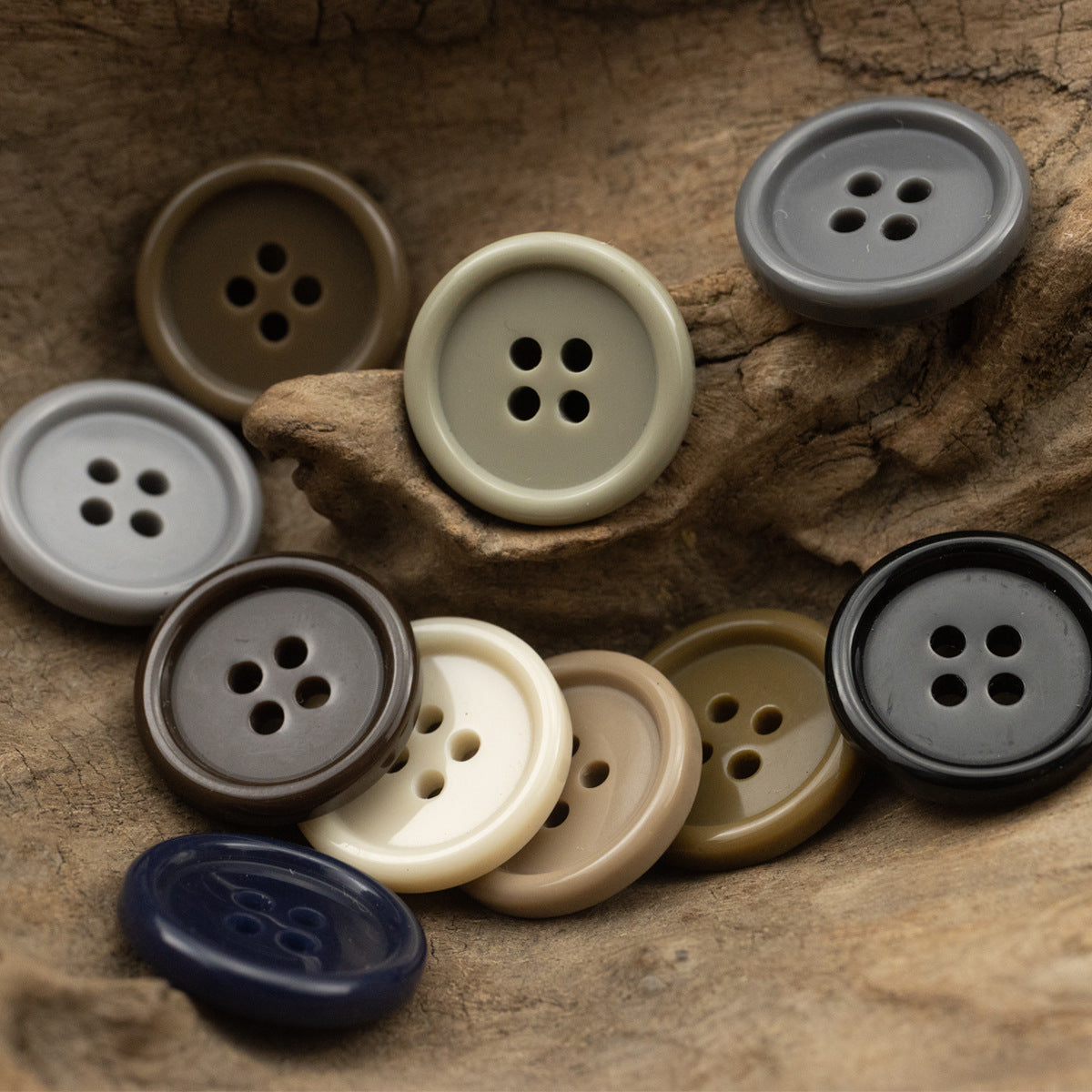 Assorted solid color resin suit buttons with 4 holes, front view group