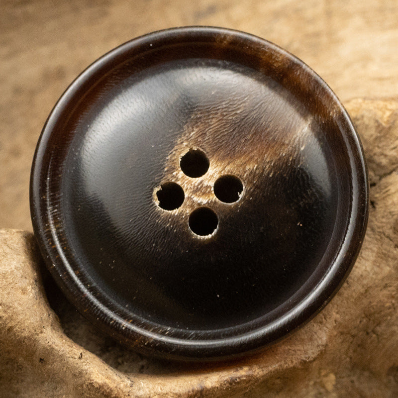 Coffee-brown natural horn round button, four holes, tang suit style