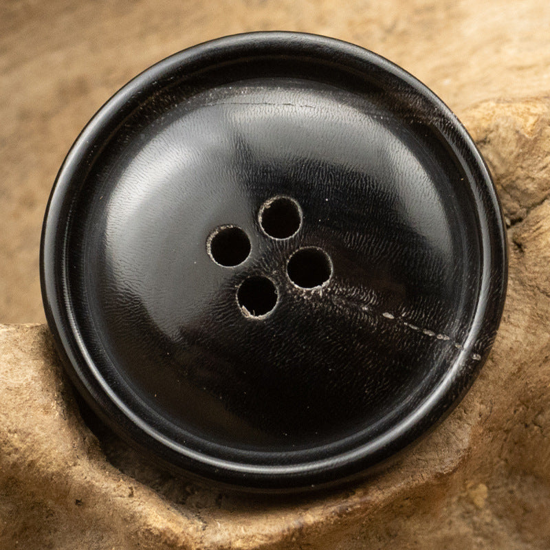 Black natural horn round button, four holes, tang suit style