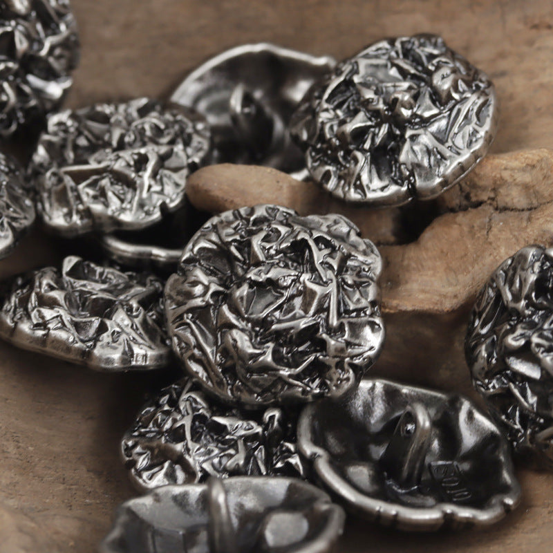 Irregular pleated metal buttons, silver tone, metal shanks and backs