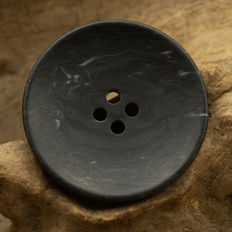 Black matte resin button, four holes, bowl-shaped, imitation wood-grain finish