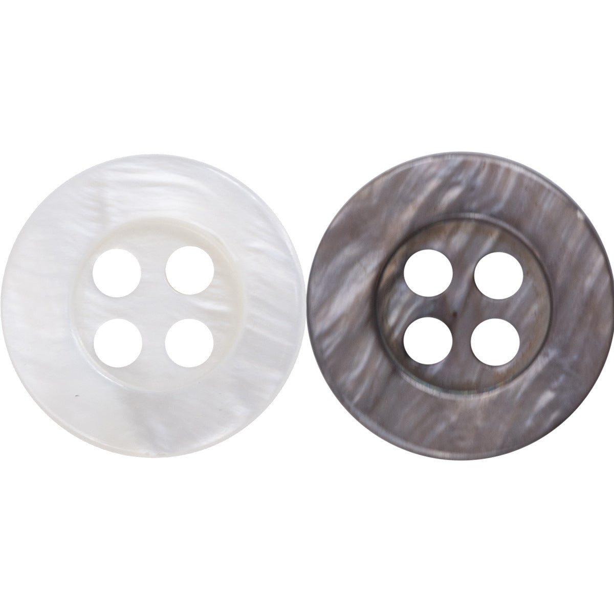 White & smoky gray pearl shell buttons, four-hole design, close-up (pair)