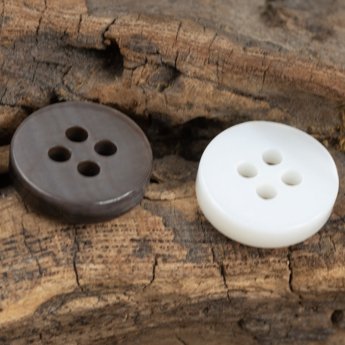 Pearl shell buttons in smoky gray and white, round 4-hole style