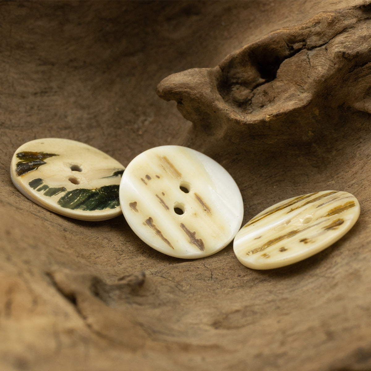 Natural river shell buttons set, flat two-hole style with mottled patterns