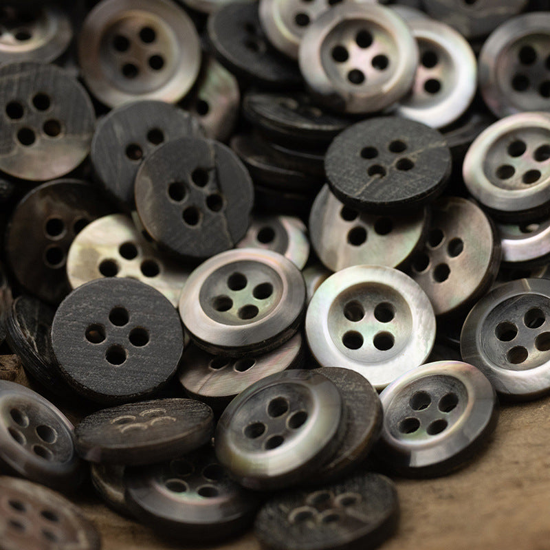 Assorted 11.5mm shell buttons, dark blue-black tones, 4-hole round shapes