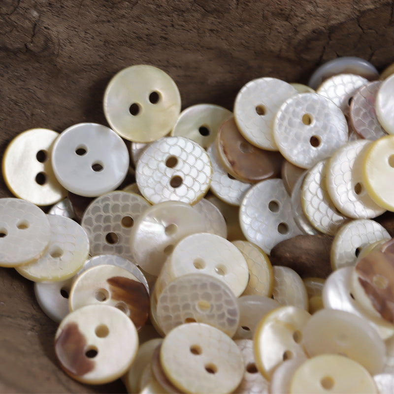 Mixed round shell buttons with fish-scale glitter texture, off-white and beige shades