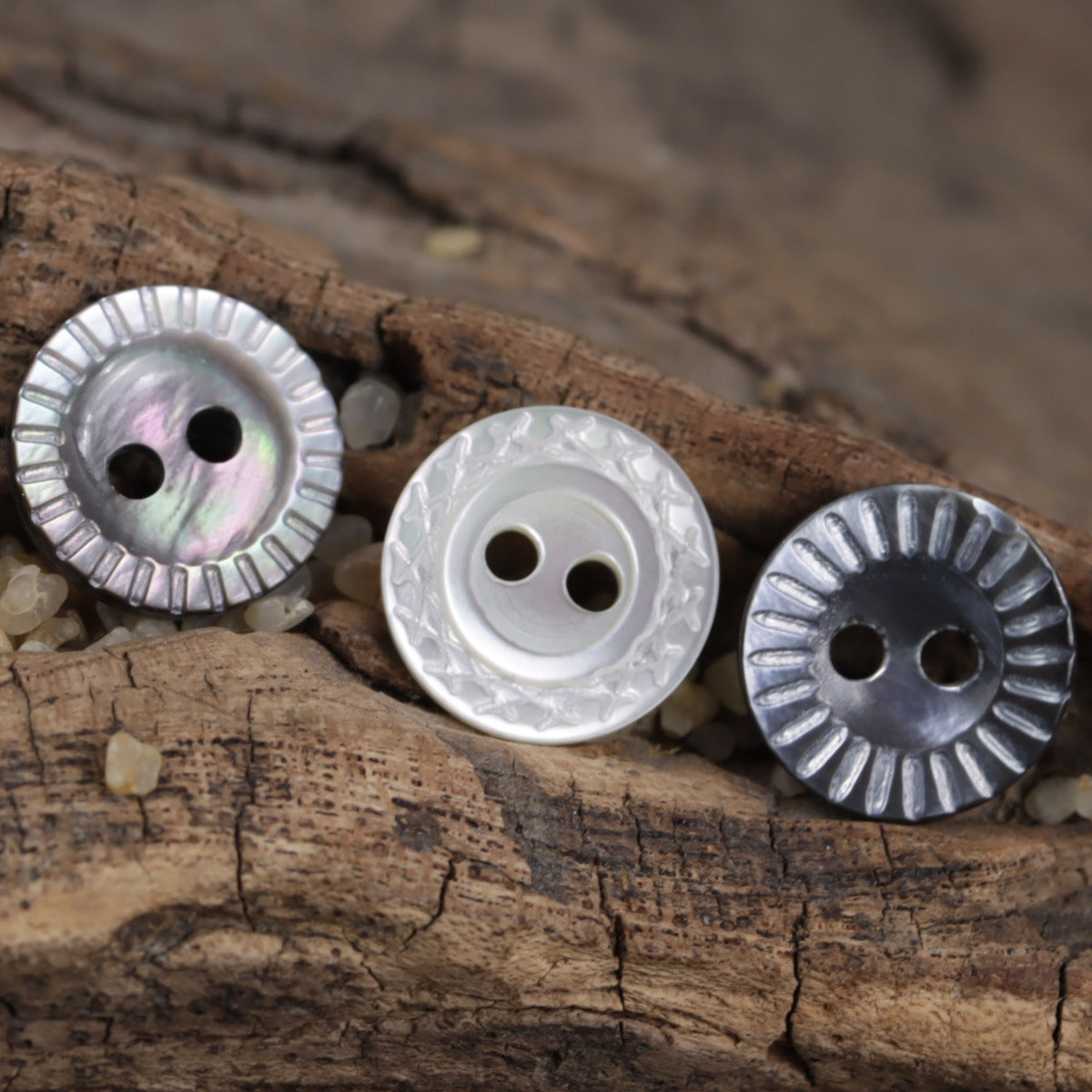 Natural mother-of-pearl buttons, white and silver iridescent, round faces with 2 holes