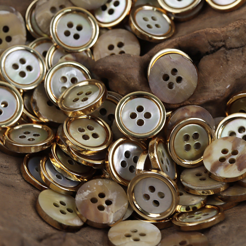 Mixed set of natural shell buttons with gold and silver metal edges, 4 holes